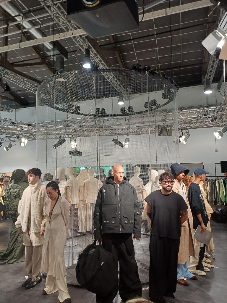Avant-garde fashion exhibition with wire mesh installation